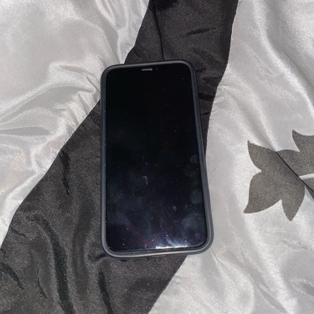 IPhone X with wallet case